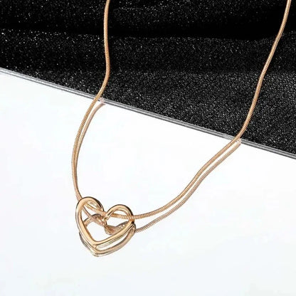 Nouveau collier pendentif en forme de cœur creux simple pour femmes, chaîne de clavicule géométrique créative, cadeau de bijoux de fête