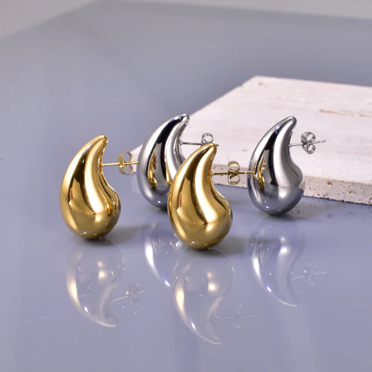 E77 Boucles d'oreilles creuses en acier inoxydable transfrontalières, des boucles d'oreilles simples pour femmes, légères, luxueuses et élégantes